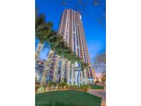 Striking full view of a high-rise building with the Allure sign and decorated palm trees at 200 W Sahara Ave # 2204, Las Vegas, NV 89102