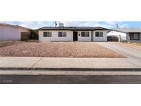 Charming single story home with well kept front yard and solar panels at 6444 Bannock Way, Las Vegas, NV 89107