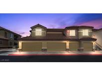 Lovely condo with private garages, tile roof, and neutral color scheme paints a perfect picture of easy living at 6868 Sky Pointe Dr # 2035, Las Vegas, NV 89131