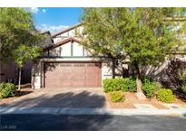 Charming home featuring an attached two car garage and a landscaped yard at 7342 Brisbane Hills St, Las Vegas, NV 89166