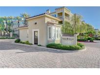View of the Terra Bella Condominiums community entrance with well-maintained landscaping at 2555 Hampton Rd # 5104, Henderson, NV 89052
