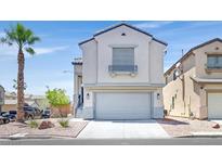 Two-story home with an attached garage and a well-maintained front yard at 3591 Gloucester Gate St, Las Vegas, NV 89122