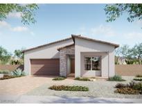 Charming single-story home featuring modern architecture and a well-manicured front yard at 889 Cottonwood Hill Pl, Henderson, NV 89011
