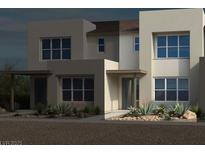 Modern two-story home featuring contemporary architecture and lush landscaping at 1485 Melodic Lark Ln, Las Vegas, NV 89138