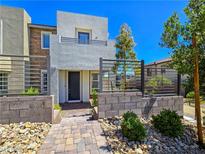Charming two-story home featuring a modern design, inviting entryway, and well-maintained landscaping at 11739 Emerald Lake Ave, Las Vegas, NV 89138