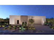 Contemporary home featuring desert landscaping and a neutral color scheme at 25 Sand Star Ln, Henderson, NV 89011
