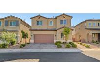 Beautiful two-story home with a well-manicured front yard and attached two-car garage at 4641 Therapeutic St, North Las Vegas, NV 89031