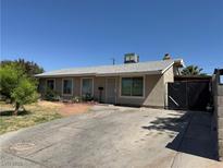 Charming single-story home featuring a well-maintained front yard and a concrete driveway at 4503 Springdale Ave, Las Vegas, NV 89121