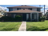 Charming condo featuring a well-maintained lawn and unique architectural elements at , Las Vegas, NV 89119