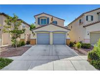 Charming two-story home with a two car garage and well-maintained landscaping at 2431 Lilac Cove St, Las Vegas, NV 89135