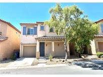 Charming two-story home featuring a covered front porch, desert landscaping, and an attached one-car garage at 7537 Brisa Del Mar Ave, Las Vegas, NV 89179