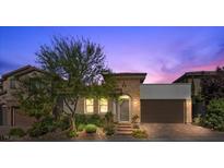 Charming single-Gathering home featuring desert landscaping and a two car garage at 251 Castellari Dr, Las Vegas, NV 89138