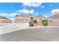 Charming single-story home featuring a two-car garage, tidy landscaping, and a welcoming facade at 5505 Verbena Creek Ct, Las Vegas, NV 89131