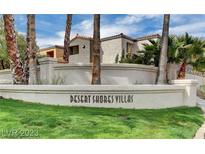 Charming Desert Shores Villas featuring lush landscaping, palm trees and stylish architecture at 3151 Soaring Gulls Dr # 1066, Las Vegas, NV 89128