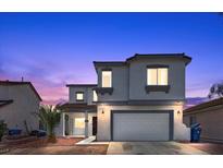 Charming two-story home with a well-maintained front yard and an attached two-car garage at 3871 Trellis View Ave, Las Vegas, NV 89115
