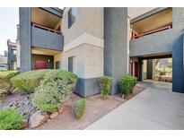 Attractive condo community featuring landscaping, covered parking, and neutral color scheme at 8600 W Charleston Blvd # 1059, Las Vegas, NV 89117