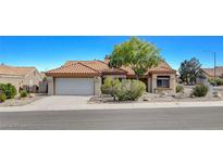 Charming single-story home featuring a well-maintained yard with rock landscaping and a neutral stucco exterior at 9337 Quail Ridge Dr, Las Vegas, NV 89134