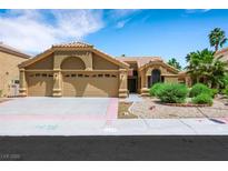 Charming single-story home with well-maintained landscaping and a three-car garage in a quiet neighborhood at 2216 Sapphire Valley St, Las Vegas, NV 89128