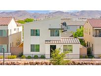 Modern two-story home with unique architectural design and well-maintained landscaping at 3058 Casarano Ct, Henderson, NV 89044