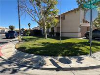 Charming single-Gathering home featuring a well-maintained lawn, neutral stucco, and a two-car garage at 6363 Berry Patch Way, Las Vegas, NV 89142