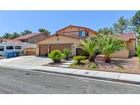 Charming single-Gathering home boasting a two-car garage and well-manicured landscaping at 8729 Pesaro Dr, Las Vegas, NV 89117