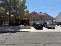 Charming single-story home featuring a two-car garage and desert landscaping at , Las Vegas, NV 89145