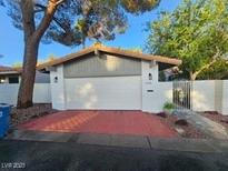 Charming single-story home featuring a brick driveway and a well-maintained front yard at 1905 Plaza Del Padre, Las Vegas, NV 89102