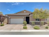 Charming single-story home featuring a two-car garage, desert landscaping, and a welcoming facade at 4523 Herbert River Ave, Las Vegas, NV 89141