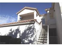 Exterior view of the condo featuring stair access to the second level at 75 N Valle Verde Dr # 225, Henderson, NV 89074