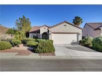 Charming single story home featuring desert landscaping and a two car garage at 2150 Maple Heights Ct, Henderson, NV 89052