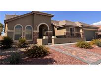 Charming single-story home featuring a tile roof and desert landscaping at 5005 Wild Thyme Ave, Las Vegas, NV 89131