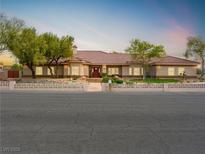 Charming single-story home featuring a tile roof and well-maintained front yard at 5340 N Campbell Rd, Las Vegas, NV 89149