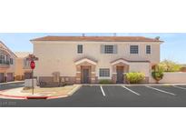Inviting townhome featuring a neutral color palette and convenient parking spaces at 89 Day Trade St # 1, Henderson, NV 89074