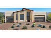 Contemporary home boasts clean lines, desert landscaping, and a two-car garage at 10809 Agate Cliffs Ave, Las Vegas, NV 89135