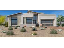 Contemporary home showcasing a modern design and desert landscaping for an appealing aesthetic at 10863 Vista Altura Ave, Las Vegas, NV 89135