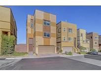 Contemporary three-story home showcasing a clean modern aesthetic and neutral color palette at 3908 Total Eclipse St, Las Vegas, NV 89129