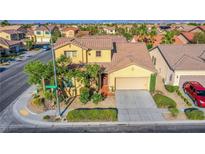 Charming two-story home with a well-manicured front yard and attached two-car garage at 8026 Sunset Creek St, Las Vegas, NV 89113