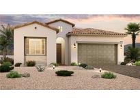 Inviting single-story home with a tile roof, a neutral color scheme, and desert landscaping at 81 Ibiza Lake Dr, Henderson, NV 89011