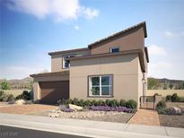A modern two-story home features a two car garage, desert landscaping, and a private entrance gate at 297 Stradella Pl, Henderson, NV 89015