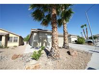 Charming single-story home with desert landscaping and a two-car garage at 6040 Eganridge Ct, North Las Vegas, NV 89081