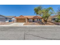 Charming single-story home with a well-maintained front yard and a two-car garage at 6112 Blossom Knoll Ave, Las Vegas, NV 89108