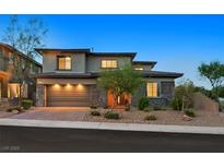 Beautiful two-story home with a well-manicured front yard and stone accents at 786 Etter Creek St, Las Vegas, NV 89138