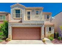 Charming two-story home with a two-car garage, balcony, and well-maintained landscaping at 9130 Beauchamp Ave, Las Vegas, NV 89148