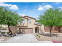 Charming home with two-car garage, low maintenance landscaping, and beautiful curb appeal at 10045 Natchez Trace St, Las Vegas, NV 89178