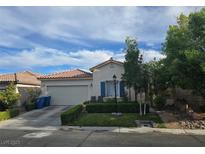 Charming single-story home with a well-maintained front yard, and a two car garage at 8277 Orange Vale Ave, Las Vegas, NV 89131