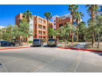 Attractive condo complex with palm trees and well-maintained landscaping in a desirable location at 43 E Agate Ave # 302, Las Vegas, NV 89123