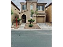 Charming two-story home with desert landscaping and a two-car garage at 7513 Brisa Del Mar Ave, Las Vegas, NV 89179