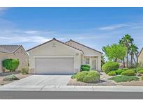Charming single-story home featuring desert landscaping and a two-car garage in a quiet neighborhood at 2548 Leighton Ave, Henderson, NV 89052