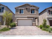 Charming two-story home with a two-car garage and a beautifully paved driveway at 3922 Painted Lady Ave, Las Vegas, NV 89141