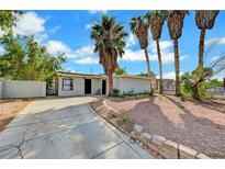 Charming single-story home with desert landscaping and a spacious driveway at 1804 David Ave, Las Vegas, NV 89101